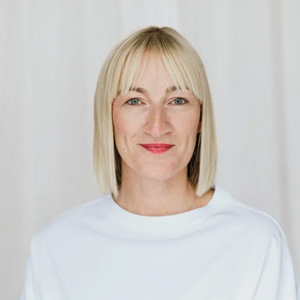 Miriam - Portraitfoto einer zufriedenen Teilnehmerin von She/BOSS